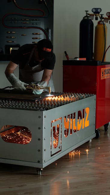 A worker skillfully operates a metal cutting tool, producing sparks in an industrial setting.
