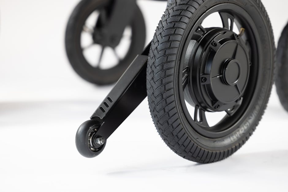 High-quality image of wheelchair wheels with a white background, showcasing modern design.