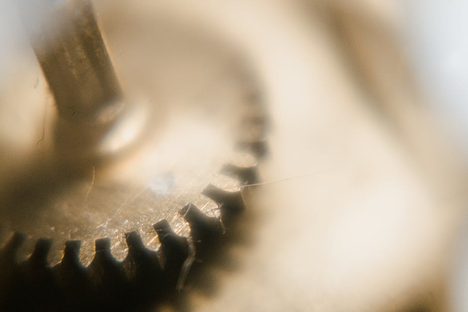 Detailed macro view of watch gear showcasing precision engineering and components.